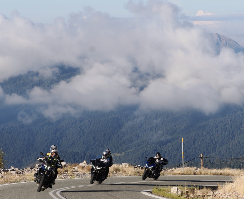 Riding up into the clouds on roads leading to the winter ski fields